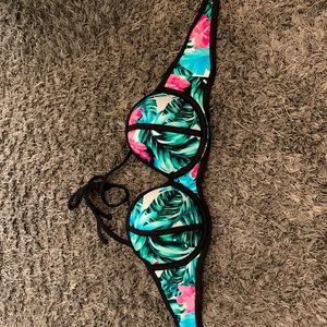 Floral bathing suit top with neon pink bottoms